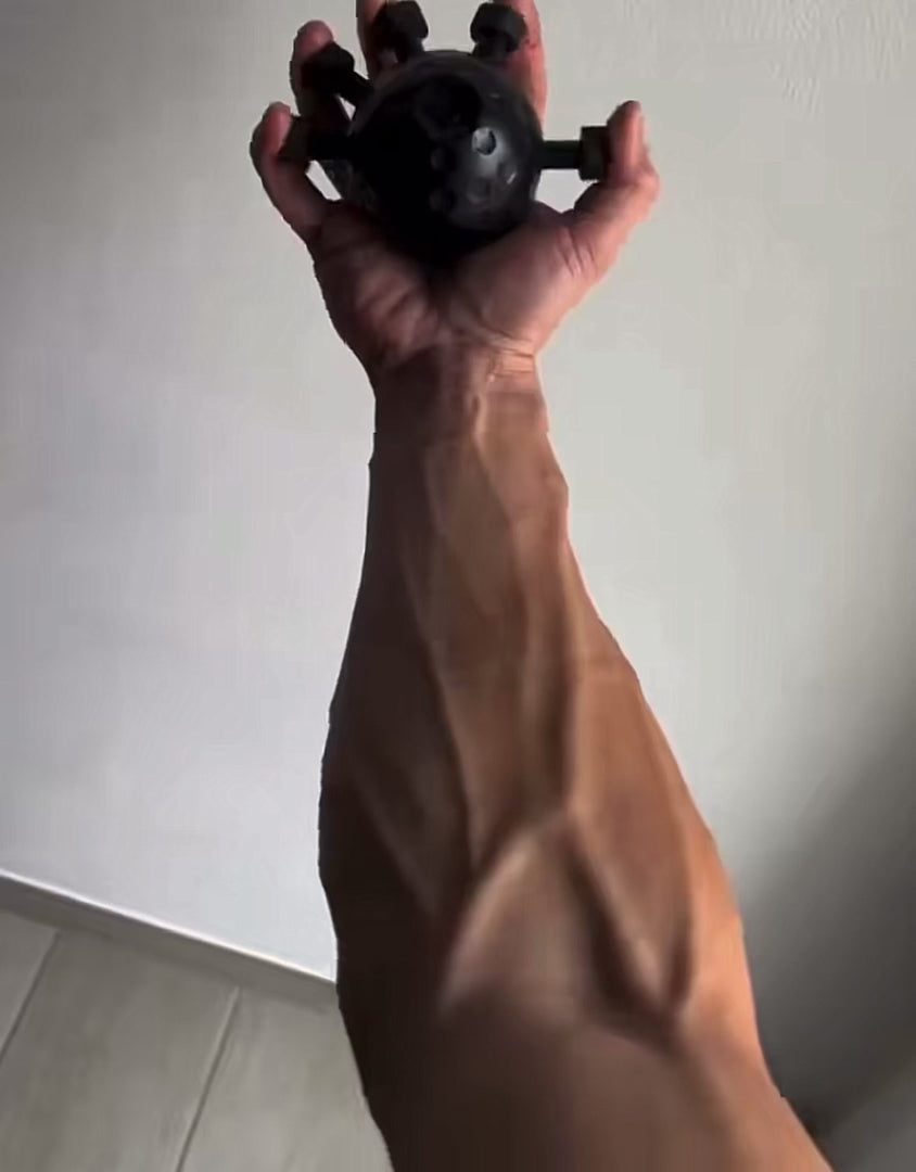 Forearm trainer in use